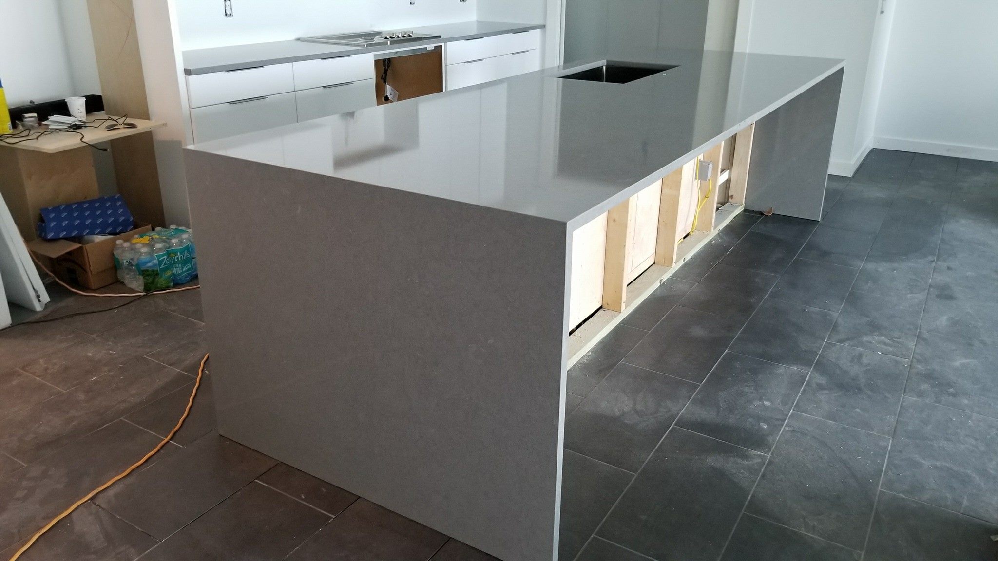 Dove Grey Quartz Island Miter Waterfall Countertop Installation In Dove Grey Quartz Island Miter Waterfall