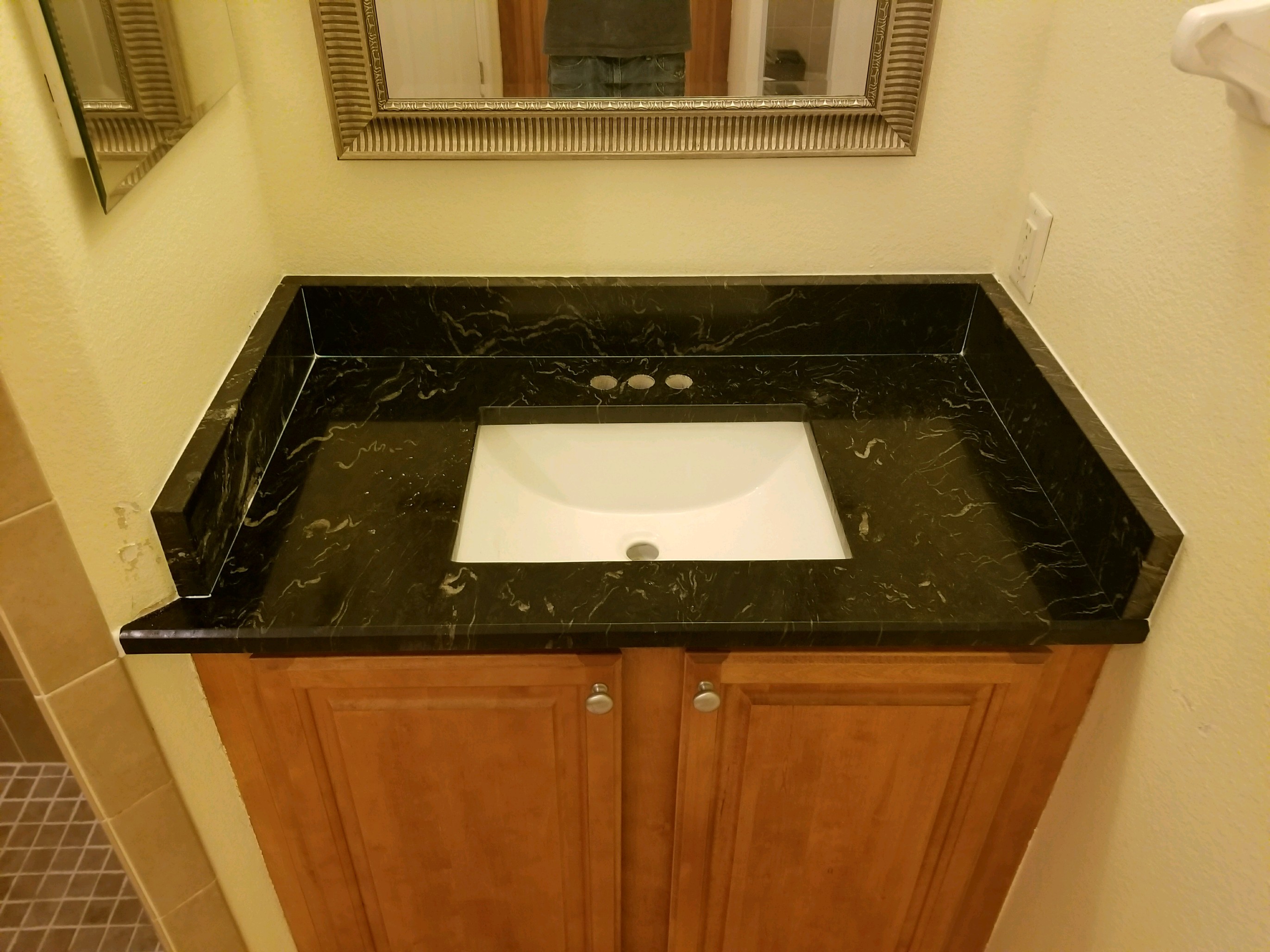 Titanium Black Granite Bathroom Countertops Remodel In Clearwater