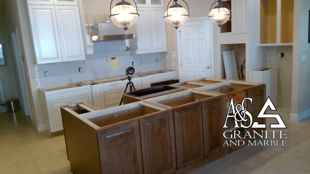 Kitchen Counetertops - Azurite island countertops - Taj Mahal surrounds with Full height backsplash - at time of template